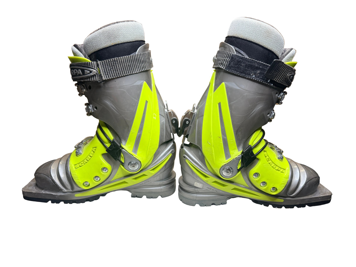 Side view of both used Scarpa T1 boots showing grey and lime shells