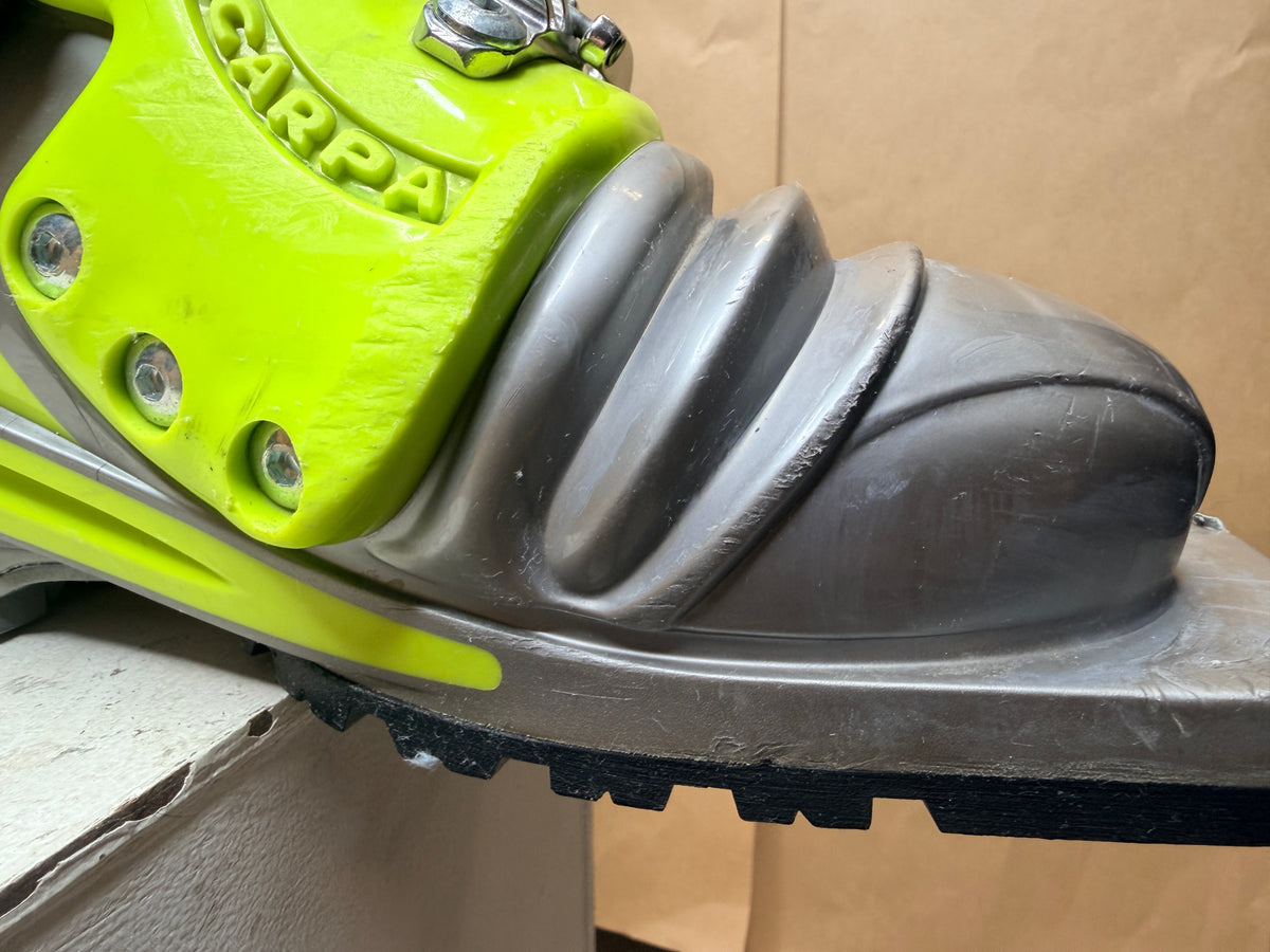 Close-up of surface wear on the Scarpa T1 boot toe and bellows