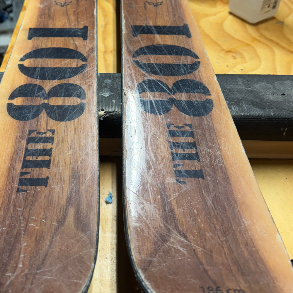 Telemark ski gear setup review showing boots, bindings, and skis for expert freeheel analysis